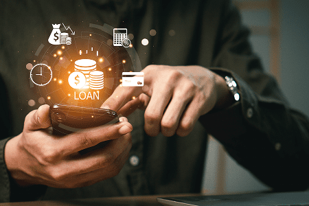 Person using smartphone with loan icons overlay.